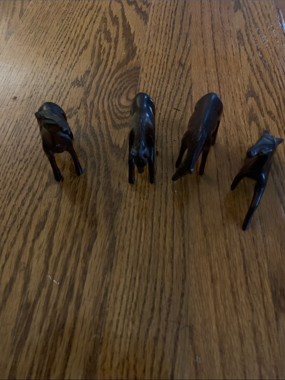 Set of Four Small Dark Wood Animal Figurines
